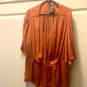 Beautiful blouse looks great with jeans or slacks.